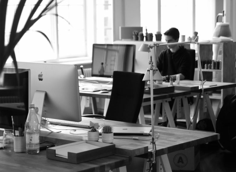 Image of an office where Ember designers work on a User Experience  & UI Design