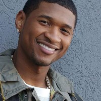 Photo of Jordan M., founder of Bloom Organics, smiling in studio setting